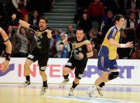 Christian Zeitz und Markus Baur drehen nach dessen entscheidenden Tor jubelnd ab.