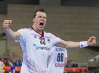 Dominik Klein jubelt �ber den 32:30-Sieg gegen Frankreich.